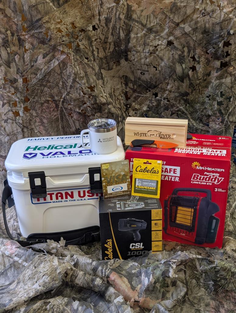 2nd - Visa gift card from Wells Index, Cabela's gift card from Certified Building Solutions, Yeti cooler from Harvey Group, Mitsubishi Yeti mug, portable heater, spot light, exclusive Deer for Gear White River knife