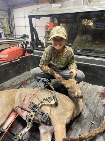 Rick DeVries' grandson wearing our old hat (ETS Inc.)