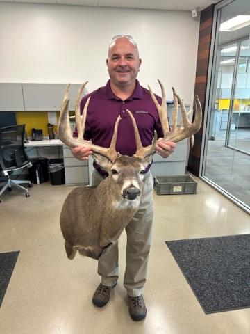 Mark was hunting in a customer's office, good thing he had a Dykehouse shirt on!
